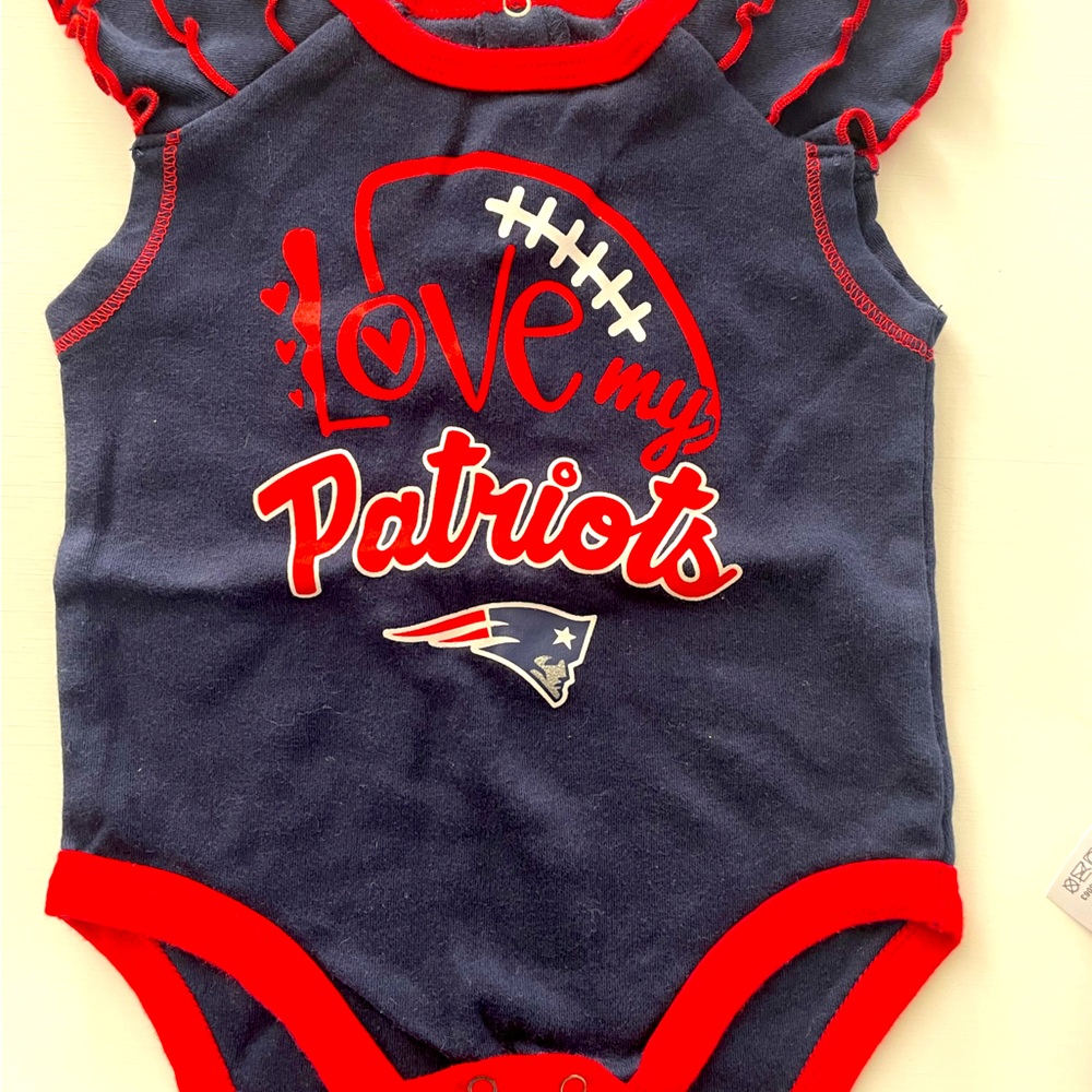 NEVER USED NFL Patriots onesies for girls. Size 3/6months.